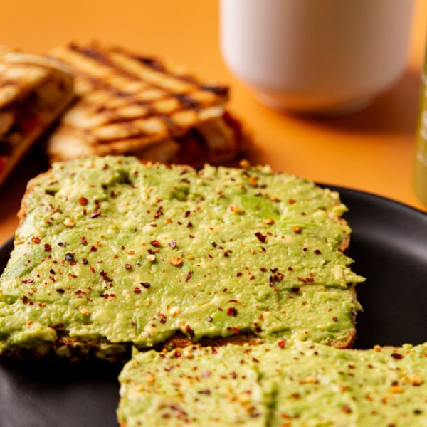 Bango Bowls green herb falafel patties served on a dark plate