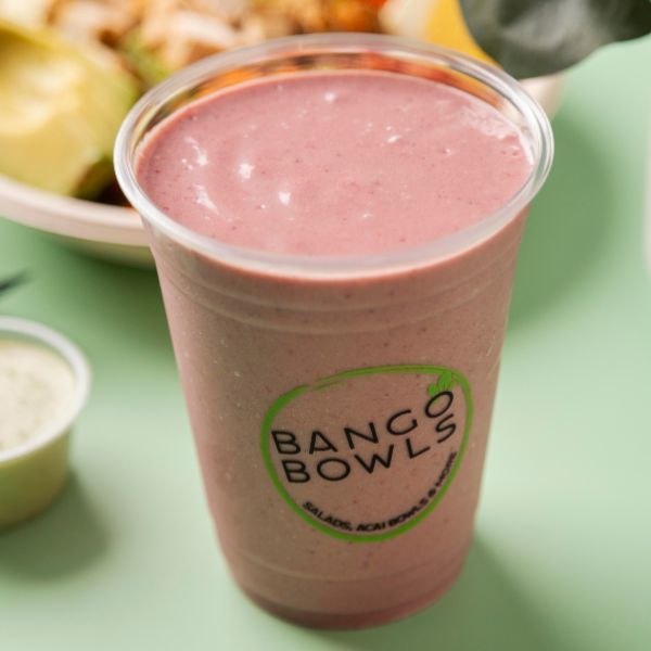 Bango Bowls branded smoothie in a cup with a berry blend